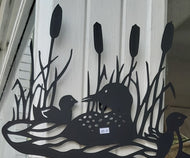 Metal loon in water